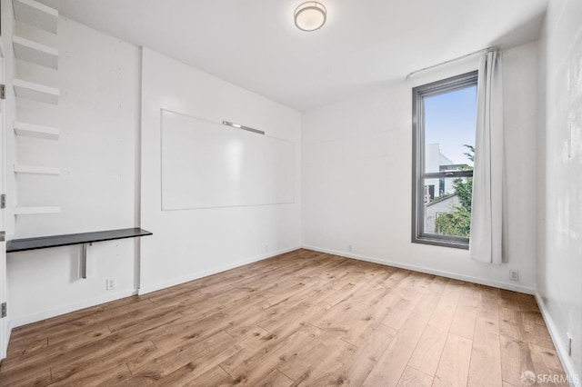 empty room featuring light wood-type flooring