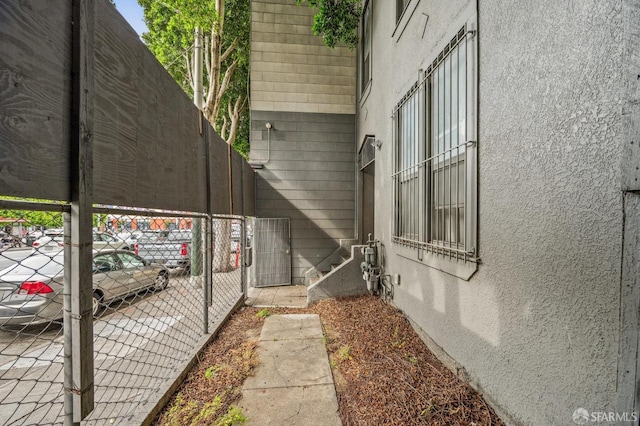 333-335 Potrero Ave, San Francisco, CA 94103 - view of home's exterior featuring stucco siding and fence