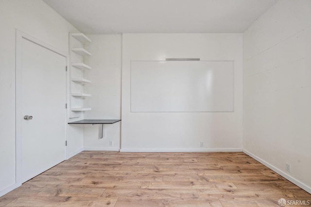 333-335 Potrero Ave, San Francisco, CA 94103 - unfurnished bedroom featuring wood finished floors