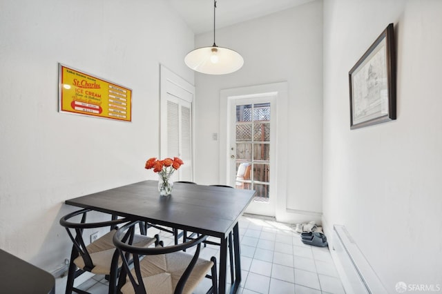 dining room featuring a wealth of natural light and light tile patterned flooring