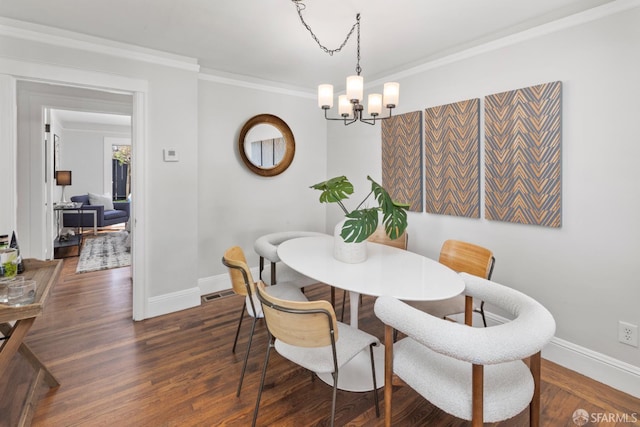 287 Staples Ave, San Francisco, CA 94112 - dining room with baseboards, crown molding, a chandelier, and dark wood finished floors