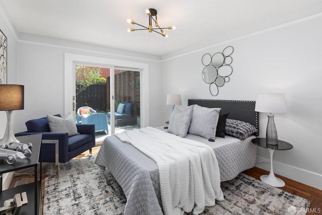 287 Staples Ave, San Francisco, CA 94112 - bedroom featuring a chandelier, access to outside, baseboards, and wood finished floors