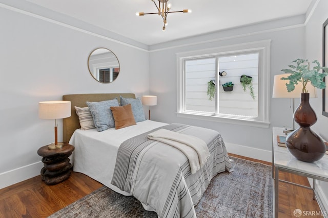 287 Staples Ave, San Francisco, CA 94112 - bedroom with a chandelier, baseboards, and wood finished floors