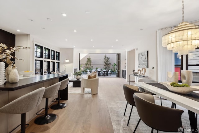 dining room with light hardwood / wood-style flooring