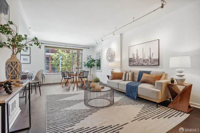 living room with track lighting and hardwood / wood-style floors