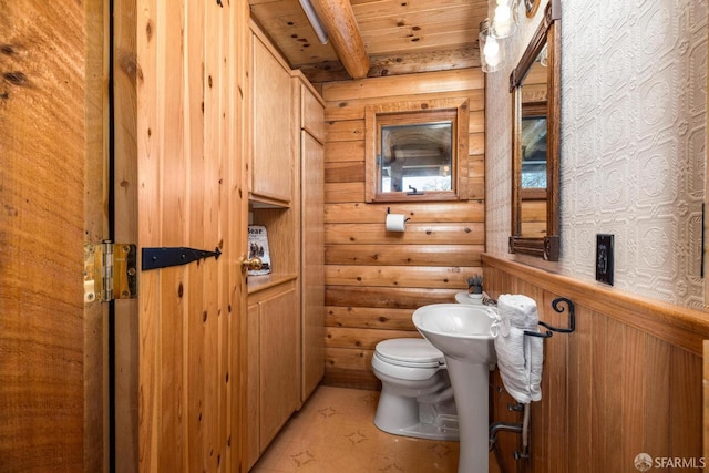 bathroom with toilet and wooden ceiling