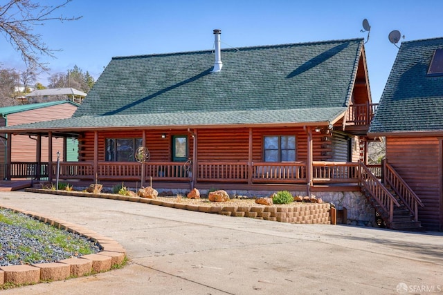 back of house with a porch