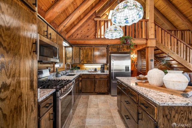 kitchen featuring appliances with stainless steel finishes, sink, wooden ceiling, and beam ceiling