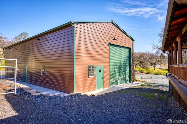 view of outbuilding with a garage