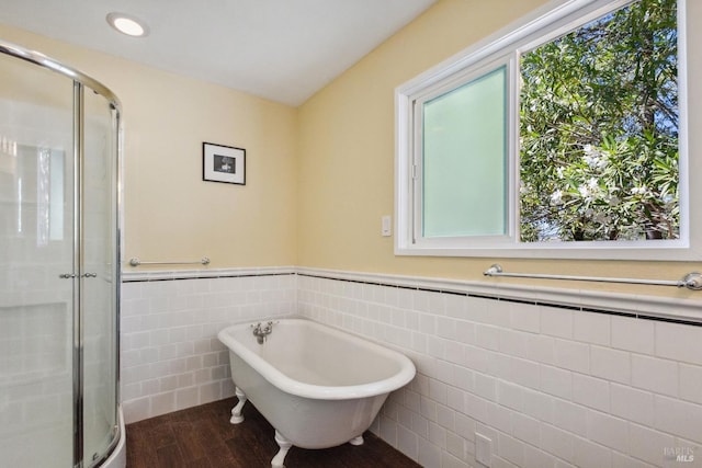3062 Soda Canyon Rd, Napa, CA 94558 - bathroom with tile walls, wood finished floors, a shower stall, healthy amount of natural light, and a wainscoted wall