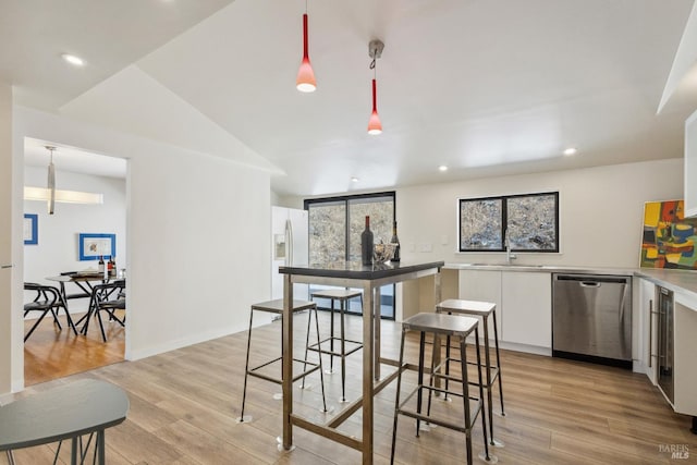 3062 Soda Canyon Rd, Napa, CA 94558 - kitchen with dishwasher, white fridge with ice dispenser, white cabinets, light wood-style floors, and recessed lighting