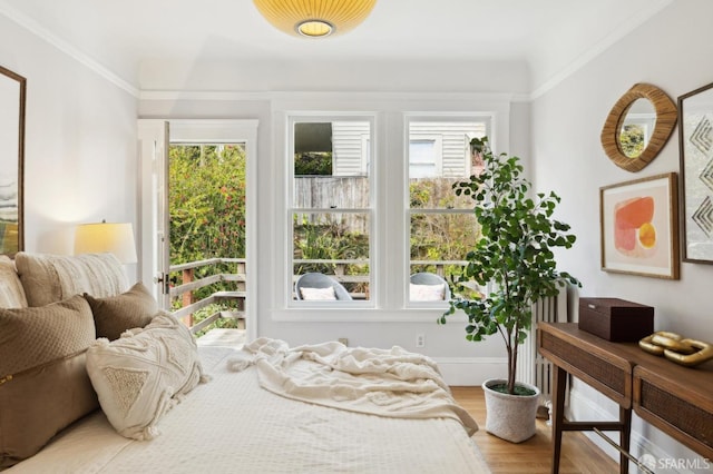 bedroom with wood finished floors