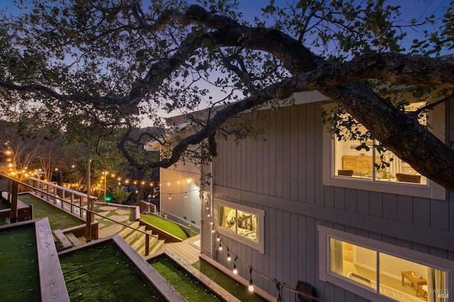 view of property exterior at dusk