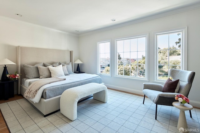 bedroom with ornamental molding, light wood-style flooring, baseboards, and recessed lighting