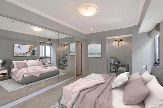 bedroom featuring a closet, baseboards, carpet, and ornamental molding