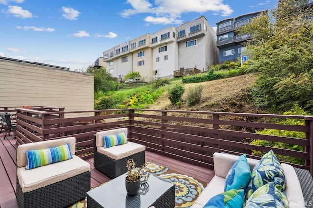 balcony with an outdoor living space and a residential view