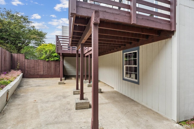 view of patio featuring fence