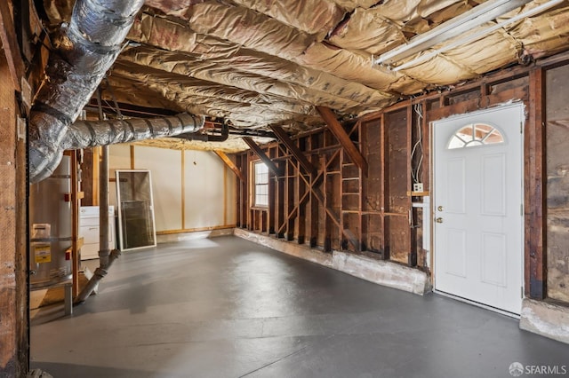garage featuring strapped water heater