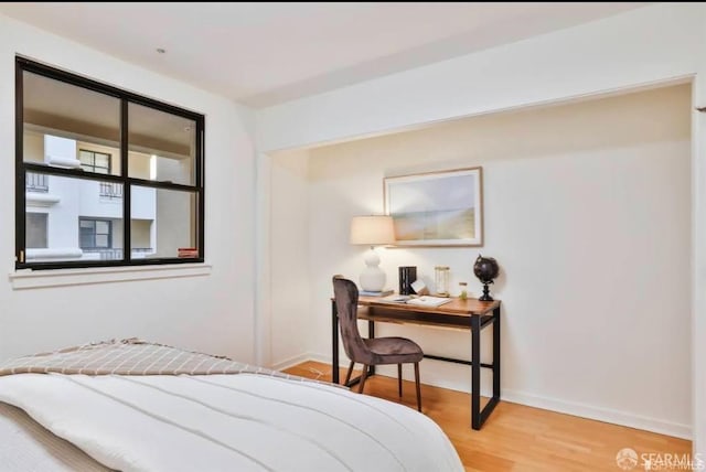 bedroom featuring hardwood / wood-style floors