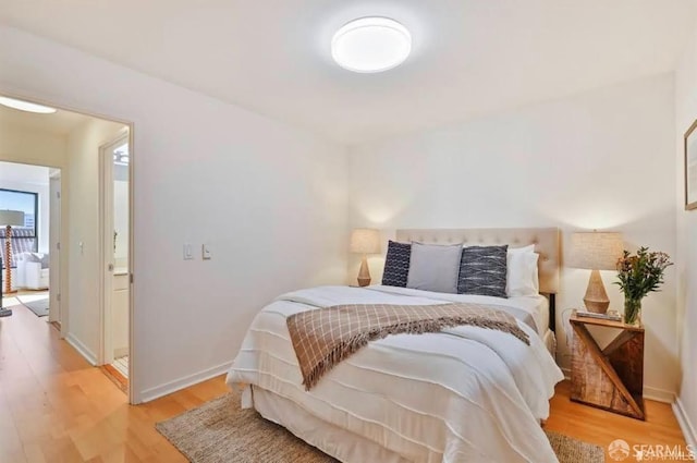 bedroom featuring light wood-type flooring