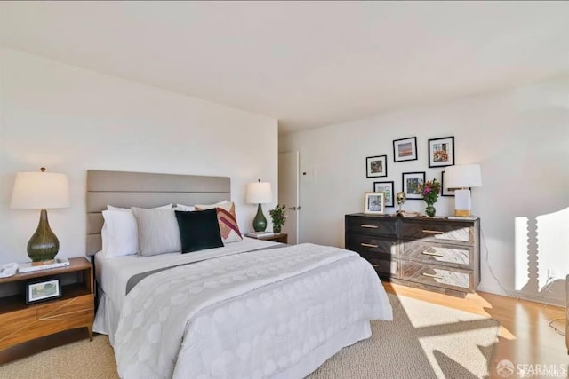 bedroom featuring light hardwood / wood-style flooring