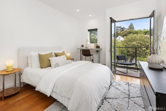 bedroom with wood-type flooring