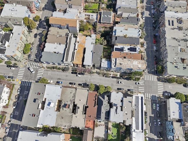 birds eye view of property with a residential view