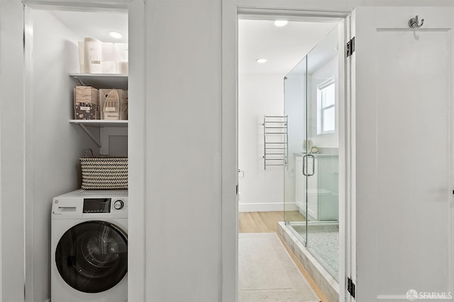 washroom with washer / clothes dryer, baseboards, light wood finished floors, and recessed lighting