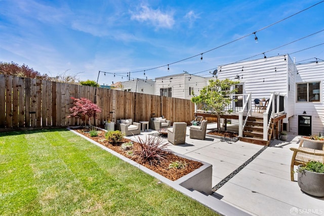 view of yard with an outdoor hangout area, a patio, and a wooden deck