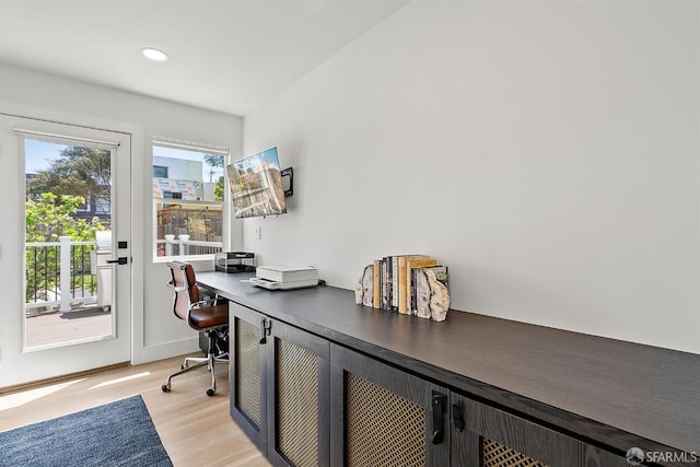 home office featuring light wood-style floors and recessed lighting