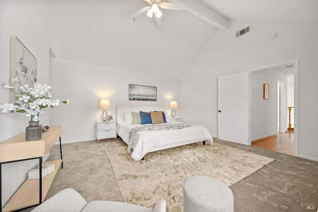 carpeted bedroom featuring visible vents, a ceiling fan, high vaulted ceiling, beamed ceiling, and baseboards