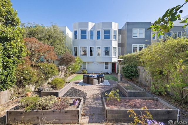 back of property with a patio area