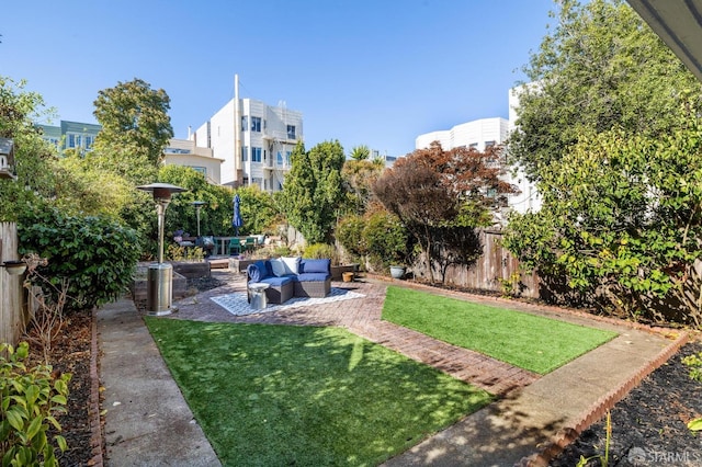 view of yard with an outdoor hangout area and a patio area