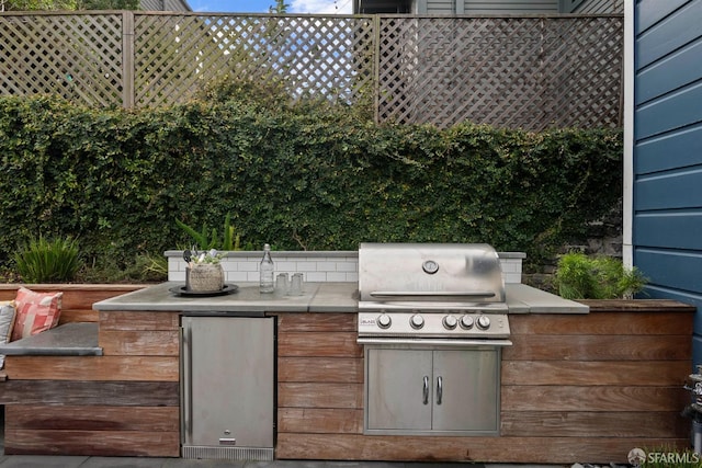 view of patio with area for grilling