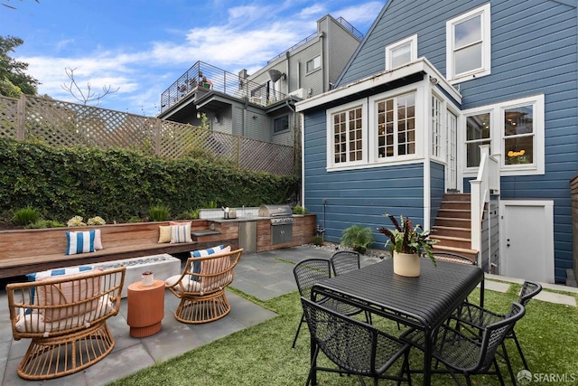 view of patio / terrace with grilling area and exterior kitchen