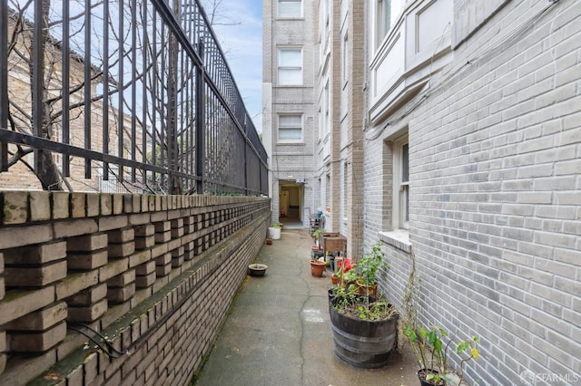 view of side of property featuring a patio area