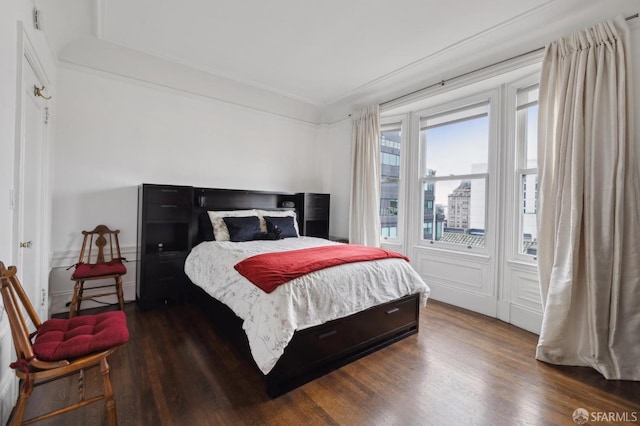 bedroom featuring dark hardwood / wood-style floors