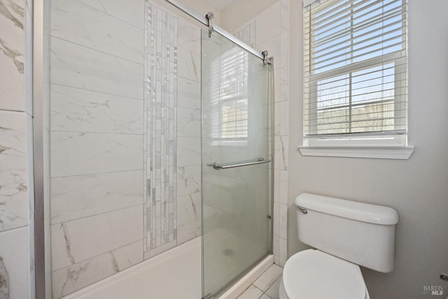 bathroom with toilet and walk in shower