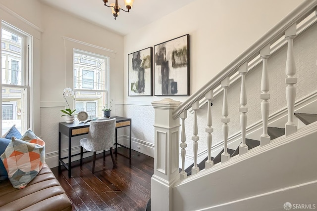 241 Lily St Unit B, San Francisco, CA 94102 - staircase with hardwood / wood-style floors, a wainscoted wall, and a chandelier
