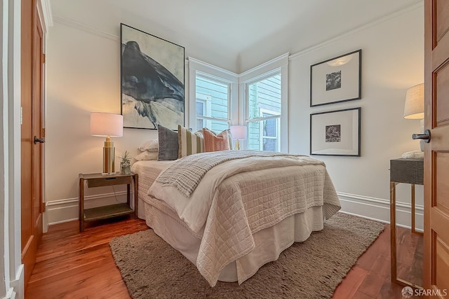 241 Lily St Unit B, San Francisco, CA 94102 - bedroom featuring wood finished floors and ornamental molding