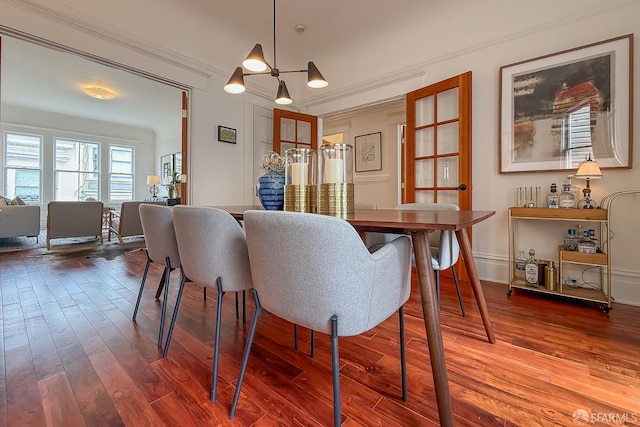 241 Lily St Unit B, San Francisco, CA 94102 - dining area with crown molding and wood finished floors