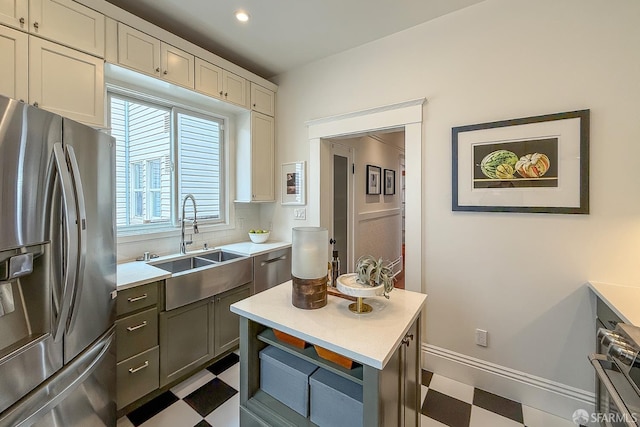 241 Lily St Unit B, San Francisco, CA 94102 - kitchen featuring stainless steel refrigerator with ice dispenser, tile patterned floors, light countertops, plenty of natural light, and recessed lighting