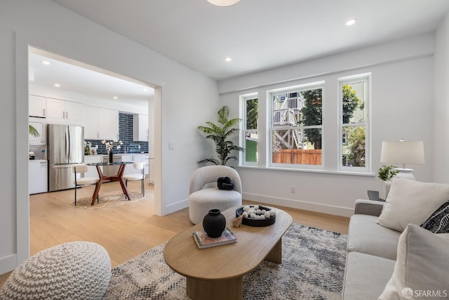 152-154 Ord St, San Francisco, CA 94114 - living room with recessed lighting, light wood finished floors, and baseboards