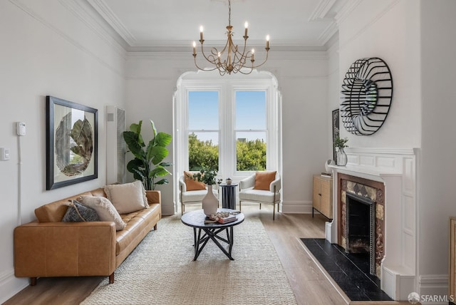152-154 Ord St, San Francisco, CA 94114 - living room with wood finished floors, a fireplace, a chandelier, and crown molding
