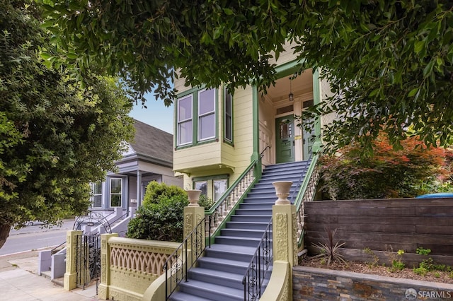 152-154 Ord St, San Francisco, CA 94114 - view of front of home with stairs and fence