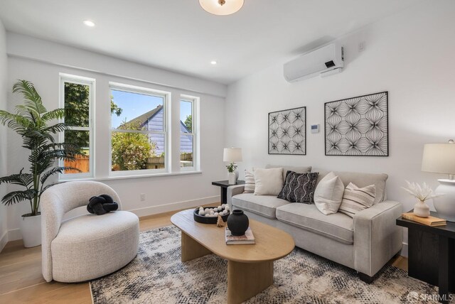 152-154 Ord St, San Francisco, CA 94114 - living area featuring a wall mounted air conditioner, light wood-type flooring, baseboards, and recessed lighting
