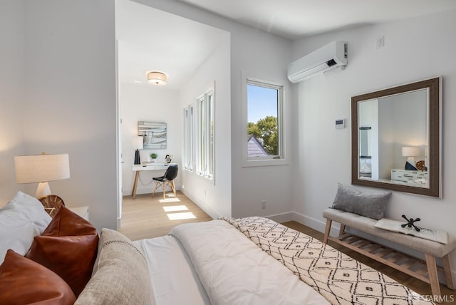 152-154 Ord St, San Francisco, CA 94114 - bedroom featuring an AC wall unit, wood finished floors, baseboards, and a desk