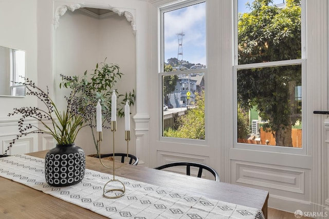 152-154 Ord St, San Francisco, CA 94114 - dining room featuring wood finished floors and a decorative wall