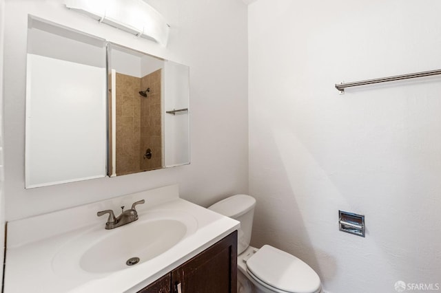 906 40th St, Oakland, CA 94608 - full bathroom featuring vanity, toilet, and a shower