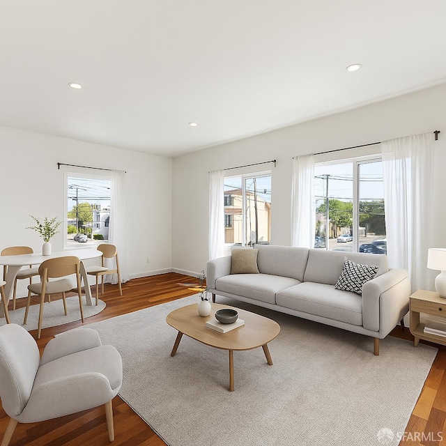 906 40th St, Oakland, CA 94608 - living area with wood finished floors, recessed lighting, and baseboards